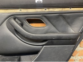 Обшивка дверей BMW E39 Задня права шкіра